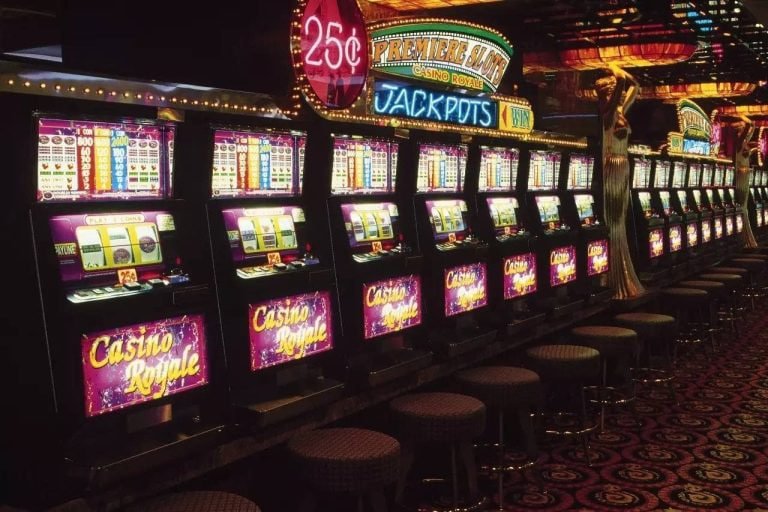 Filipino player using evotaya platform on a mobile phone to access sports and casino sections